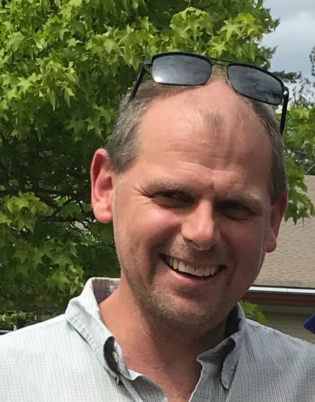 Steve Hunter smiling outdoors